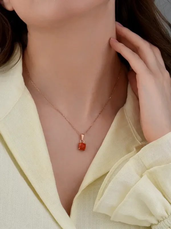 Подвеска из серебра с кораллом, золочение