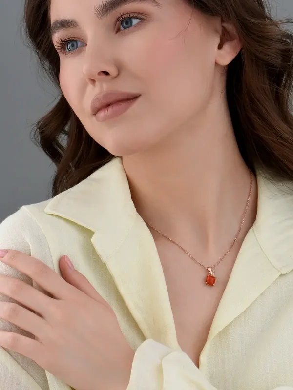 Подвеска из серебра с кораллом, золочение