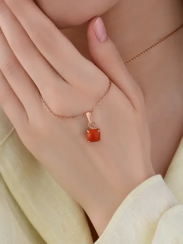 Подвеска из серебра с кораллом, золочение