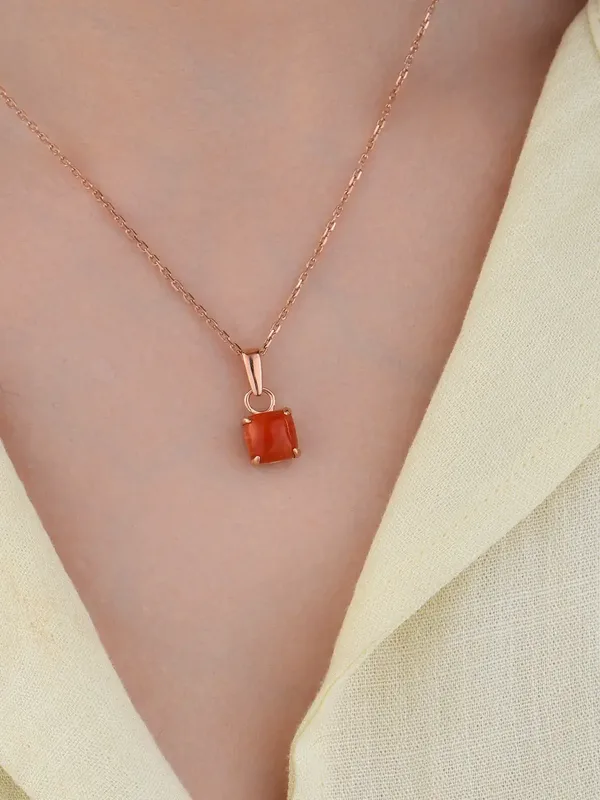 Подвеска из серебра с кораллом, золочение